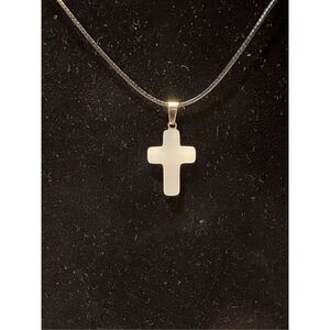 White Stone Cross on a Black Necklace Cord